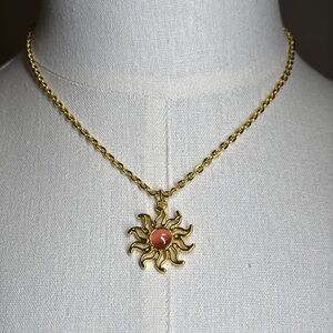Red Gem Gold Starburst Necklace